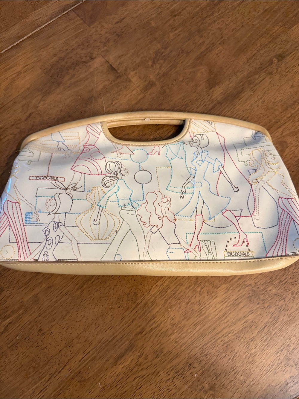 BCBGirls Cream Multicolor Sketch-Print Handheld Clutch